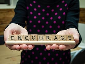 scrabble tiles with inspiration phrase