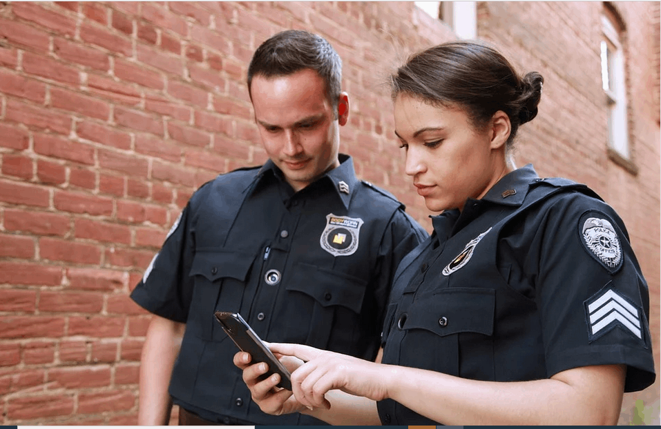 police officers with clothes with patches embroidered a